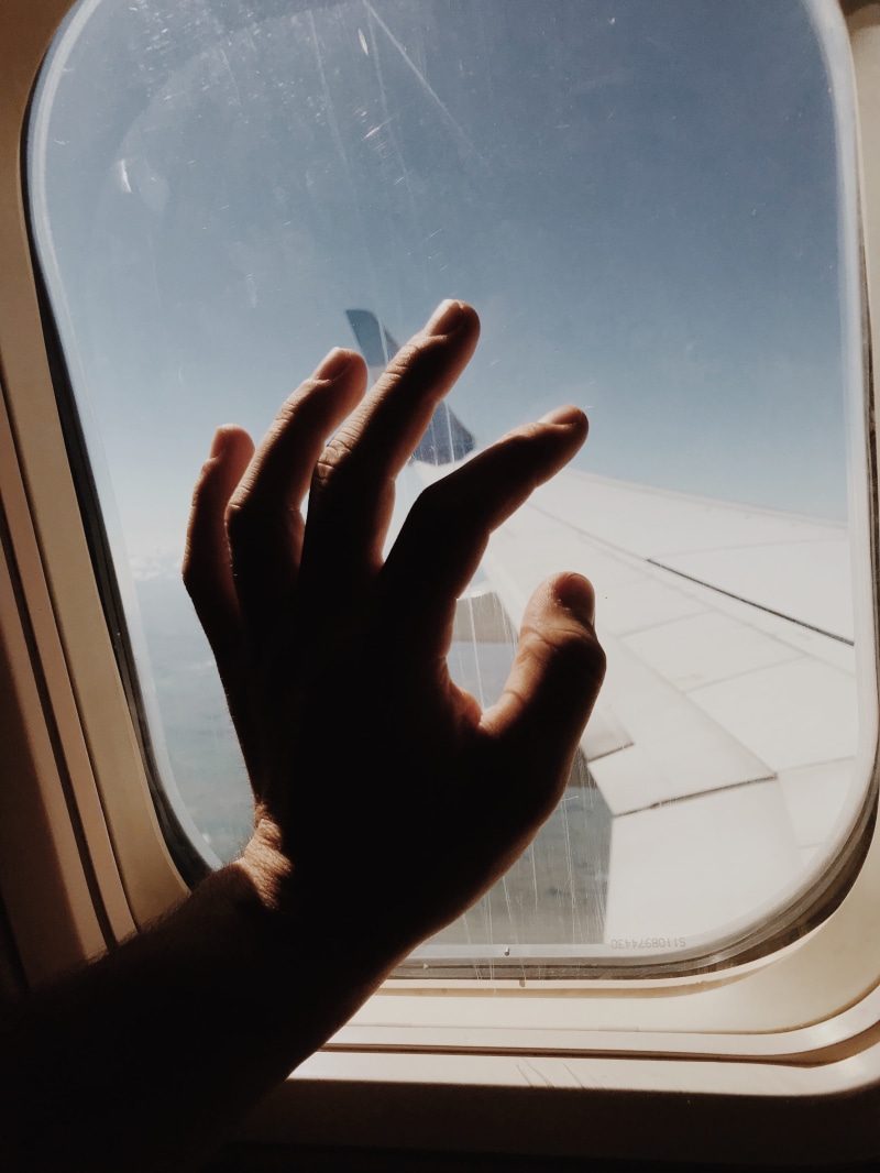 vacation, bariloche, human finger, airplane, day, holding, glass - material, machine, alloy wheel, 4K, mirror, transparent, vacaciones, human hand, nature