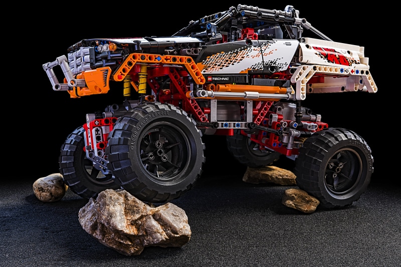 mature, off-roader, plastic, nature, outdoor, car, gears, auto, wheel, rock - object, background, commercial land vehicle, background image, terrain, play