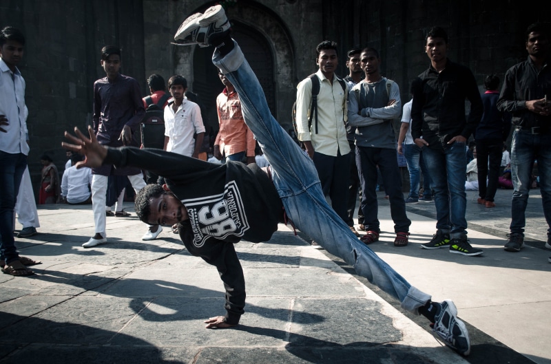 men, casual clothing, dance, dancing, shirt, city, people, front view, young men, outdoors, shadow, city life, black, adult, lifestyles, women, street