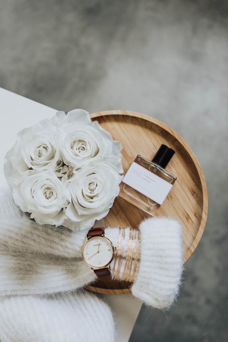 beauty in nature, high angle view, table, close-up, architecture, bouquet, nature, cosmetics, watch, plant, still life, flower head, white color, directly above