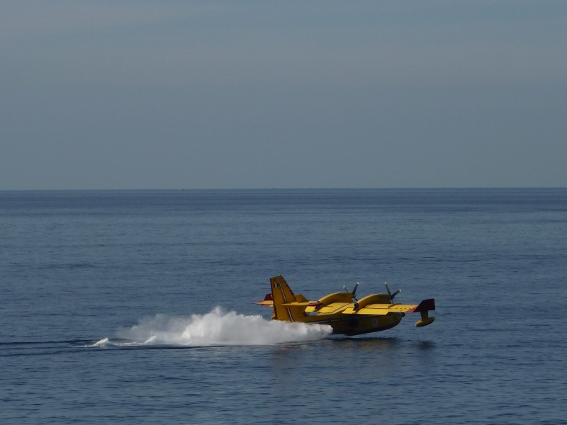 yellow, mediterranean, beauty in nature, clear sky, Forest Fire, transportation, mode of transportation, aircraft, horizon over water, sky, forest, recreational boat