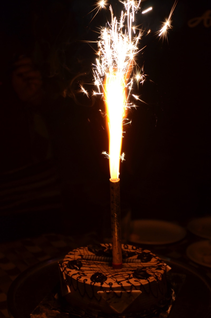 firework - man made object, exploding, burning, Sparkles, motion, Cake, happy birthday, glowing, 4K, focus on foreground, Candle, no people, close-up