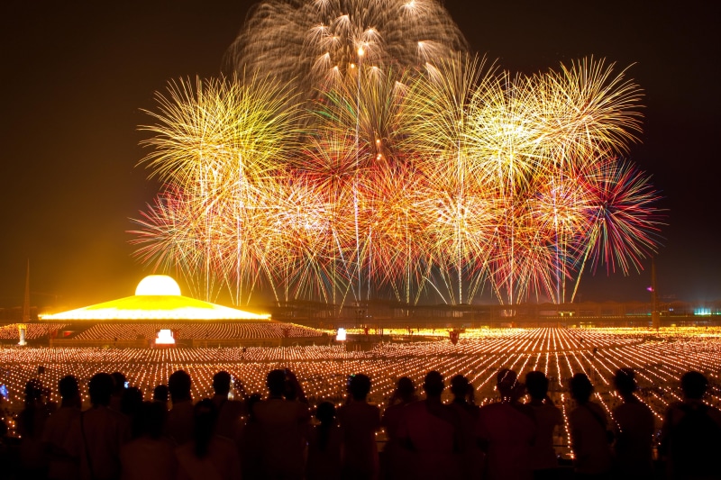 watching, firework Display, real people, wat, exploding, new years eve, fire - Natural Phenomenon, people, enjoyment, thailand, traditional Festival, firework