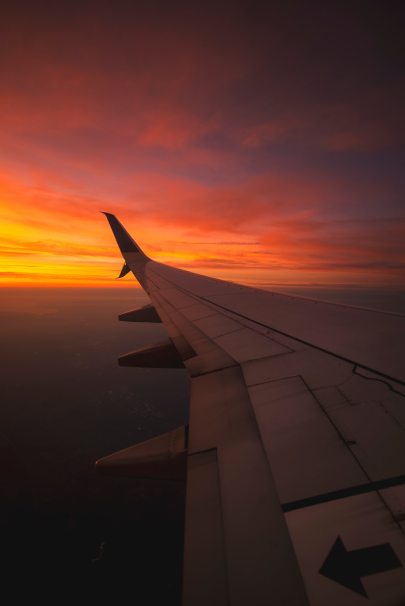 mode of transportation, travel, commercial airplane, aircraft wing, aerospace industry, cloud - sky, no people, outdoors, sunset, transportation, nature