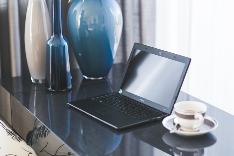coffee cup, wireless technology, furniture, coffee, tech, crockery, technology, desk, business, mug, table, modern, black, working space, coffee - drink
