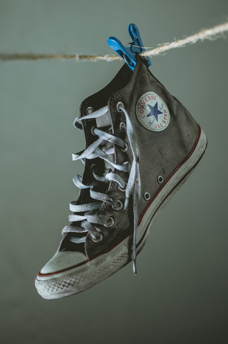 hanging, indoors, no people, shoelace, blue, converse, personal accessory, 4K, high angle view, close-up, shoe, canvas shoe, wall - building feature, hanged