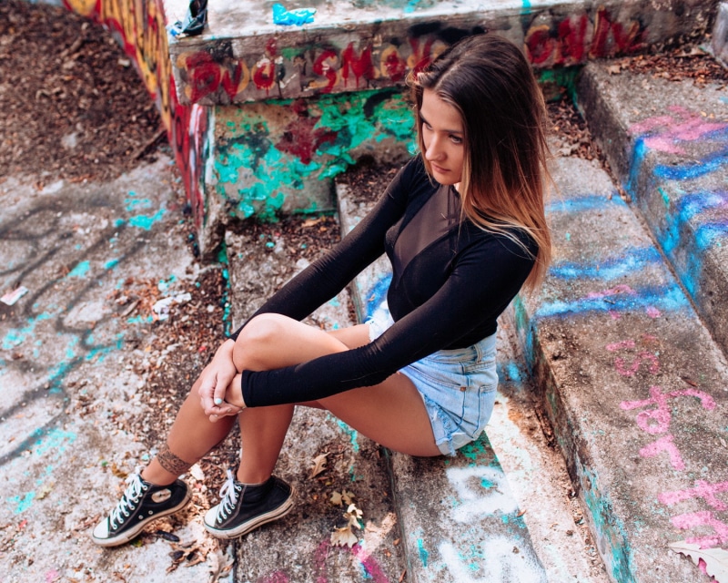 street art, adolescence, women, stairs, one person, long hair, looking away, beauty, young women, portrait, adult, lifestyles, hairstyle, day, sitting