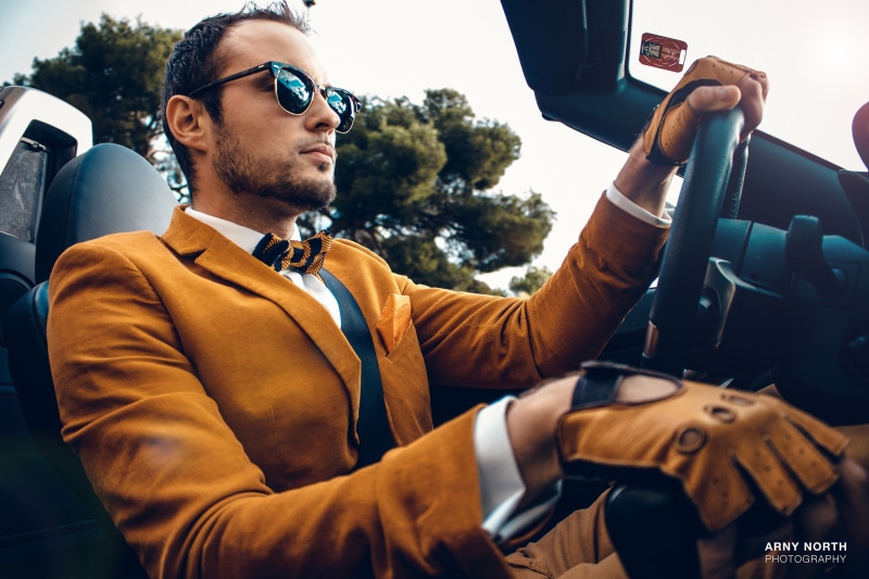 land vehicle, BMW Z4, people, motor vehicle, notched, mode of transportation, transportation, glasses, outdoors, jacket, bow-tie, s, fashion, real people