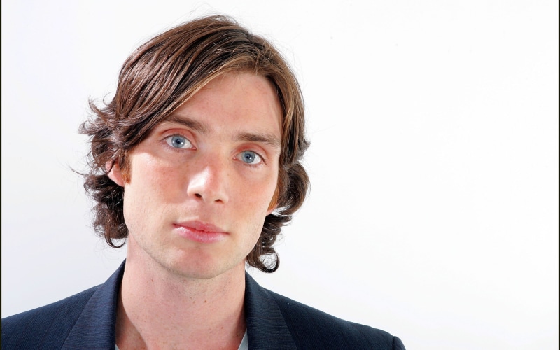 business person, front view, close-up, headshot, white background, contemplation, copy space, looking at camera, 2K, young adult, cillian murphy, hairstyle
