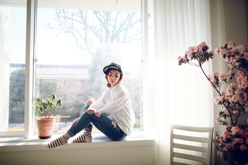 potted plant, nature, 480P, home interior, furniture, Asian, day, casual clothing, brunette, young adult, white shirt, contemplation, young men, happiness