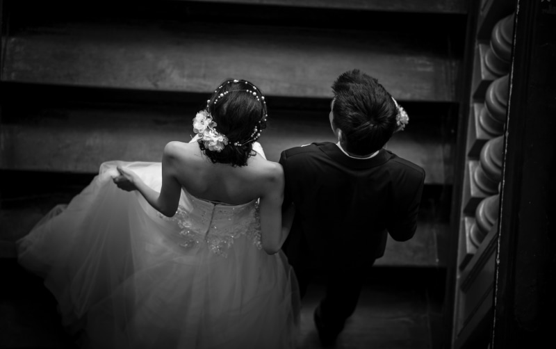 monochrome, men, bonding, adult, newlywed, life events, lifestyles, arm around, indoors, two people, event, women, togetherness, weddings, 2K, rear view