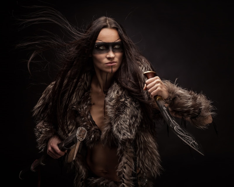 hair, black background, glamour, beauty, indoors, fantasy girl, adult, fur coat, brown hair, clothing, beautiful people, warrior, beautiful woman, one person