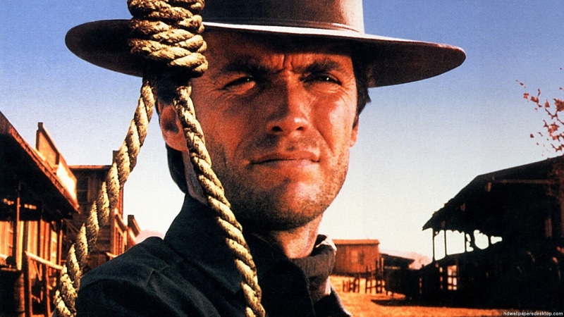 Hang Em High, outdoors, s, hat, real people, clothing, clear sky, one person, Clint Eastwood, day, shirt, males, front view, black, sunlight, looking at camera