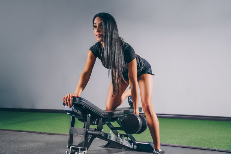 Sports, casual clothing, exercise equipment, healthy lifestyle, full length, one person, looking away, athlete, muscular build, determination, effort, seat