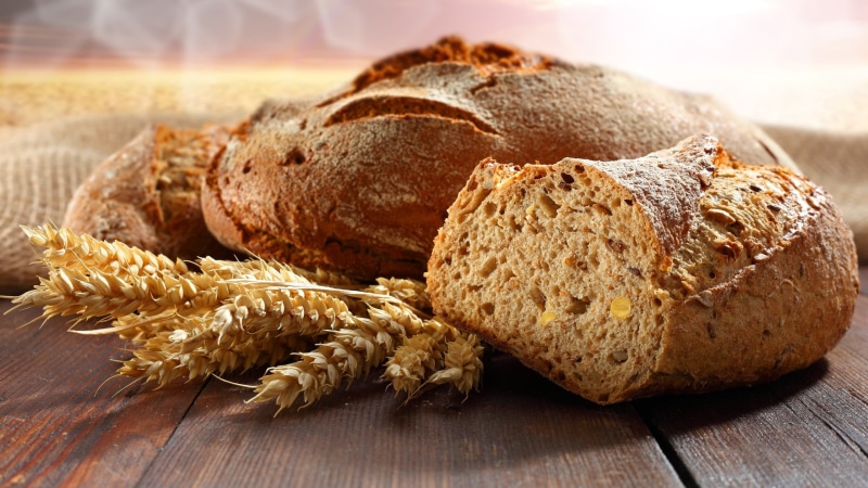 wheat, baked, carbohydrate - food type, raisin, no people, food and drink, table, homemade, cereal plant, wood - material, agriculture, loaf of bread, whole wheat