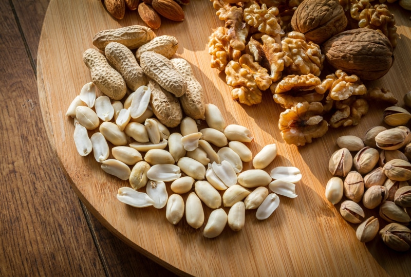 almonds, food and drink, wooden, table, eating, still life, breakfast cereal, variation, shell, plate, cashew, 4K, almond, selection, nut, indoors, tasty
