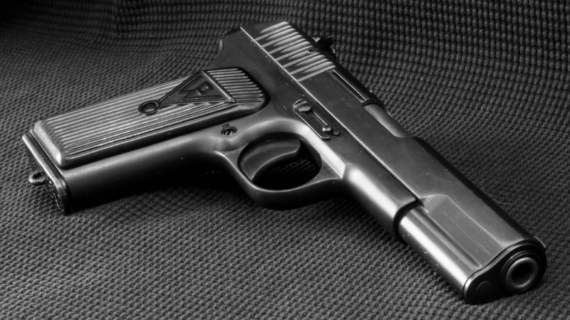 aggression, TT-33, handgun, security, studio shot, warning sign, still life, crime, close-up, weapon, violence, pistol, ammunition, communication, safety