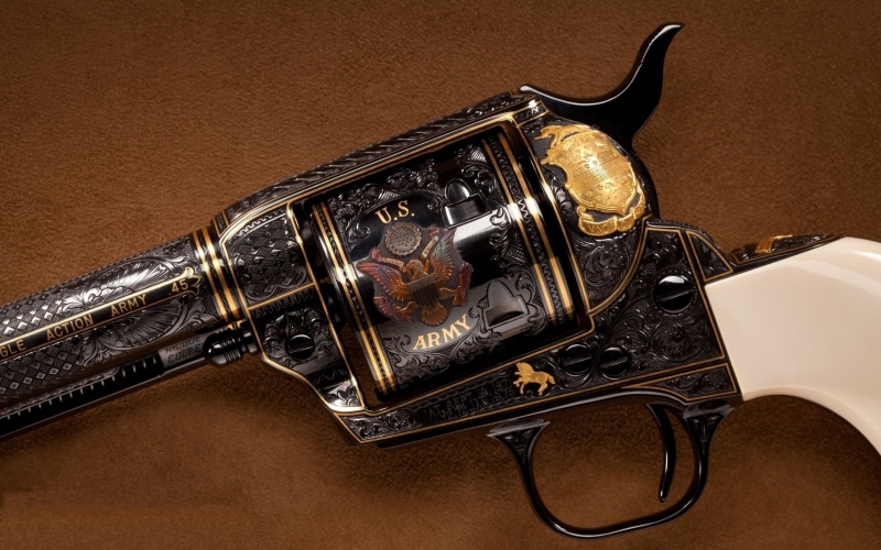 musical instrument, revolvers, personal accessory, high angle view, indoors, music, arts culture and entertainment, metal, revolver, black, pistol, gold colored
