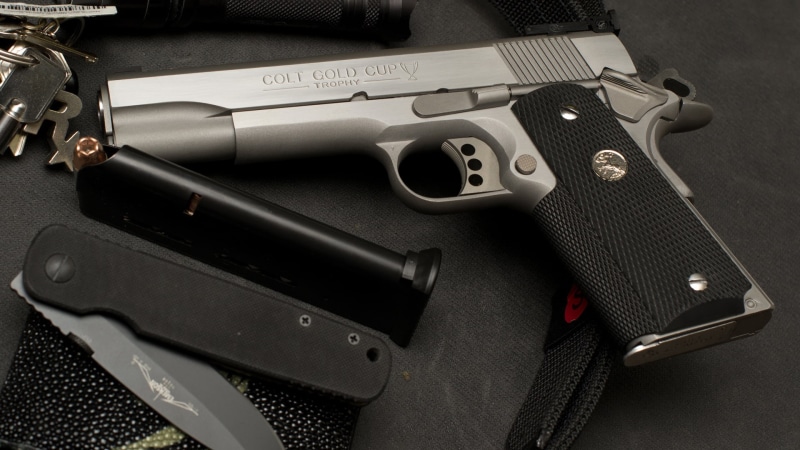 keys, handgun, social issues, aggression, crime, protection, sign, semi, clip, high angle view, 1911, threats, silver colored, government, machine gun