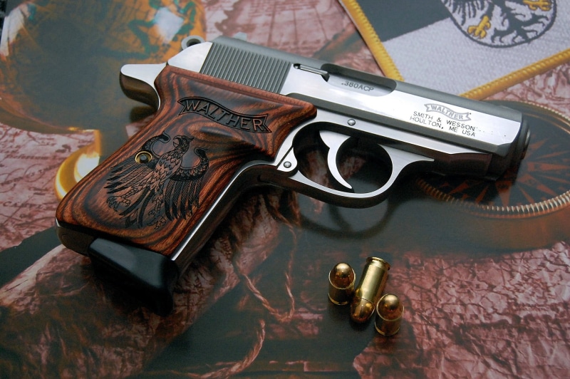 gun, old, black, weapons, music, high angle view, pistol, floral pattern, no people, table, aggression, semi, weapon, automatic, Walther, brown, PPK/S