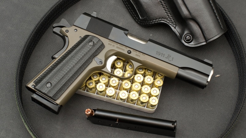 calculator, bullet, communication, gun, still life, automatic, single Object, push button, black, table, typewriter, indoors, sign, steel, trigger, crime