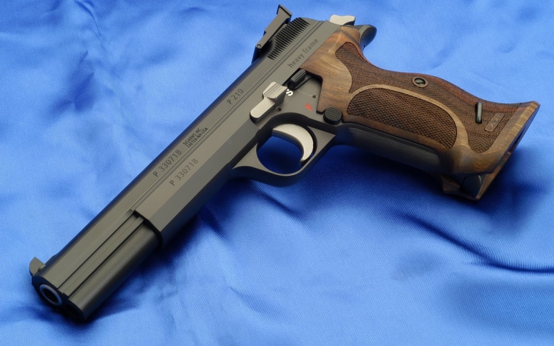 automatic, law, sign, indoors, violence, military, blue, army, isolated, textile, war, crime, danger, gray, still life, single Object, handgun, weapons