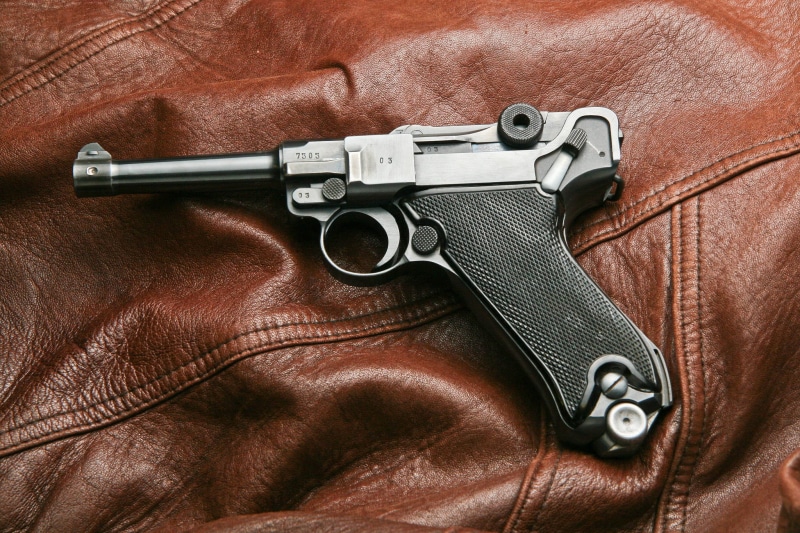 warning sign, brown, communication, leather, indoors, weapons, no People, full frame, army, security, P08, semi-Automatic Pistol, 1080P, social issues