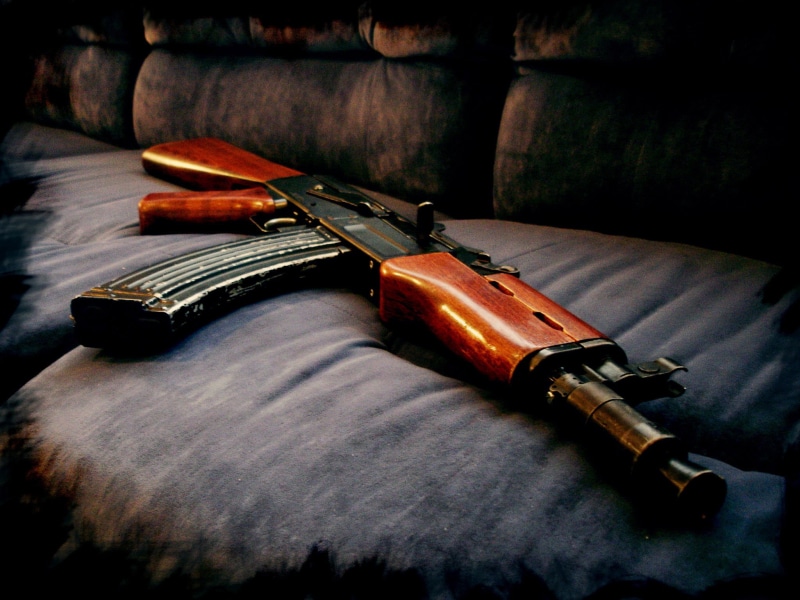 warning sign, indoors, communication, table, ammunition, single object, gun, social issues, weapons, sign, retro Styled, metal, AK-47, 1080P, musical Instrument