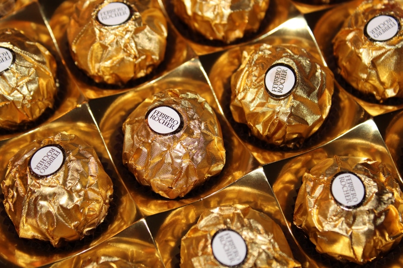 shiny, indoors, number, metal, luxury, still life, ferrero rocher, food and drink, no people, nut, tasty, high angle view, sweet, gold colored, walnut