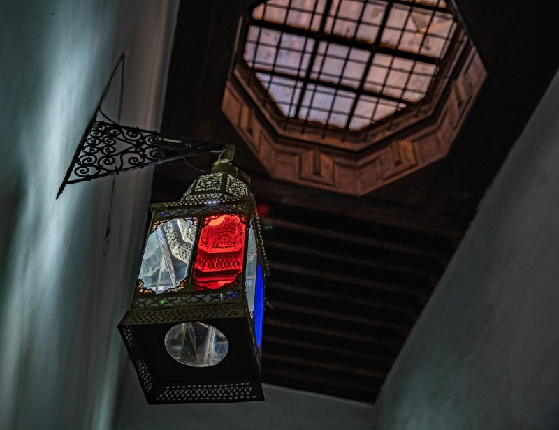 furniture, indoors, human representation, lamp, lantern, light, high angle view, led, light fixture, clothing, day, domestic room, pattern, 5K, focus on foreground