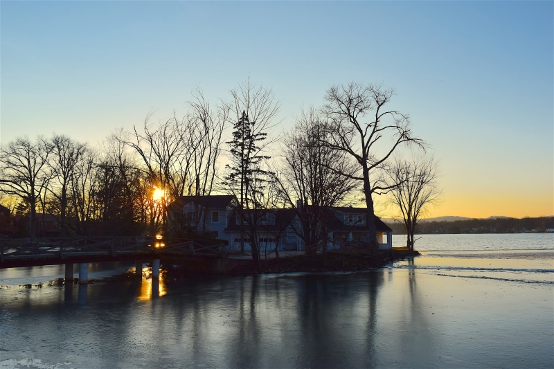 scenics - nature, scene, light, bare tree, twilight, ice, snow, reflection, architecture And Buildings, house, no people, building, sky, sunny, architecture