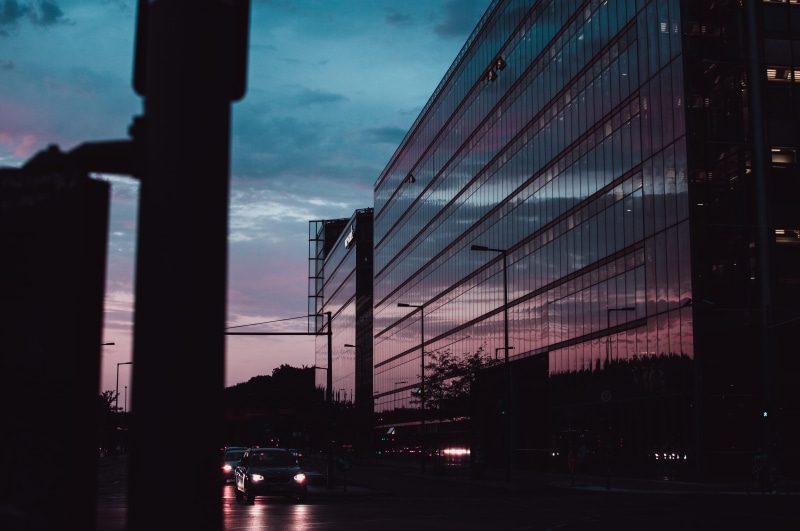 motor vehicle, asphalt, no people, potsdamer platz, passing, sunset, buildings, 5K, convention center, cloud - sky, berlin, nature, dusk, transportation