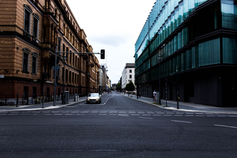 surface level, direction, street urban, germany city, the way forward, sky, outdoors, built structure, light, urban, building, land vehicle, street, transportation