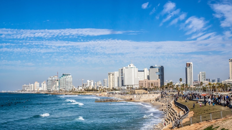 israel, waterfront, skyscraper, tall - high, office building exterior, outdoors, urban skyline, building exterior, downtown, cloud - sky, water, day, person