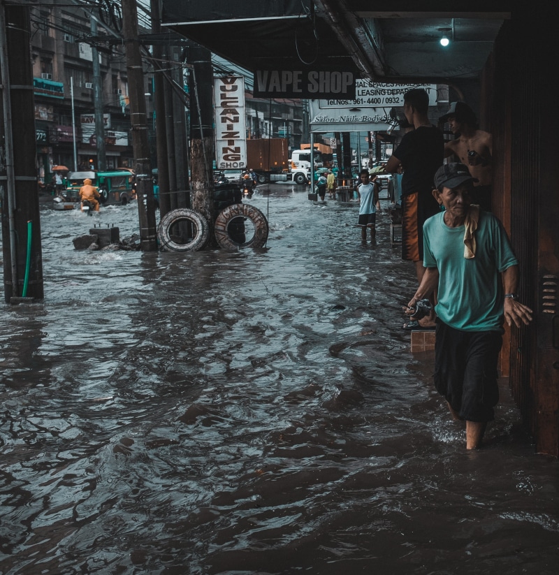 built structure, women, street life, architecture, incidental people, people, men, philippines, rain, building, street art, travel, group of people, wet