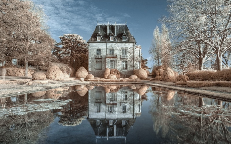 outdoors, lake, history, chateau, sky, built structure, waterfront, the past, reflection, architecture, tree, building, brown, no people, water, bare tree