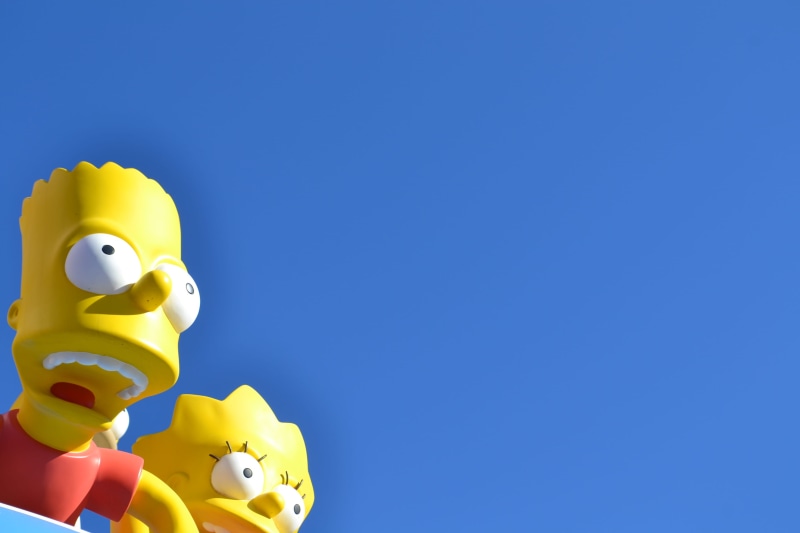 finance, consumerism, universal city, debt, blue, representation, 2K, animal representation, yellow, simpson, lisa, business, cartoon, universal studios boulevard