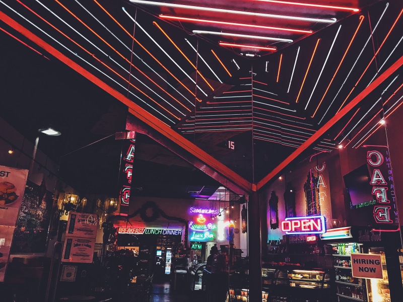 building exterior, glowing, bar, store, outdoors, low angle view, illuminated, urban, lighting equipment, design, los angeles, sign, city life, text, ceiling