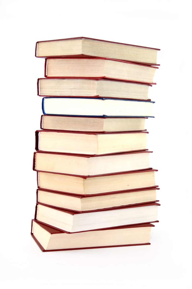 bookmark, college, literature, indoors, learning, studying, books, library, large group of objects, pile, intelligence, studio shot, people, hardcover