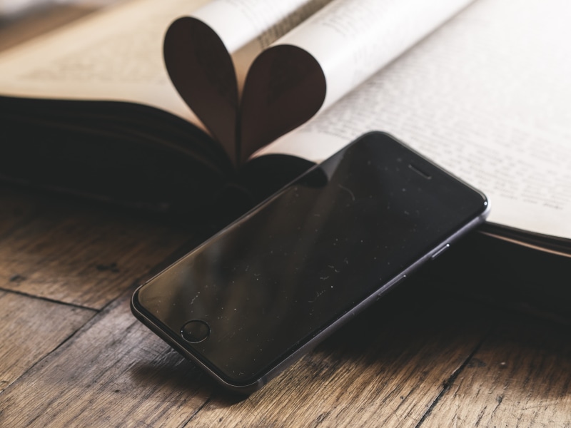 study, black, indoors, knowledge, gray, bookcase, communication, table, information, smartphone, library, space, smart, personal accessory, dark, still life