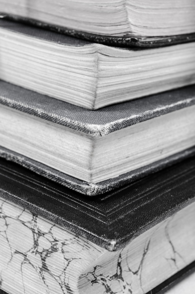hardbound, publication, no people, learning, text, bookshelf, stack, white, full frame, red, textured, education, yellow, object, focus on foreground, page