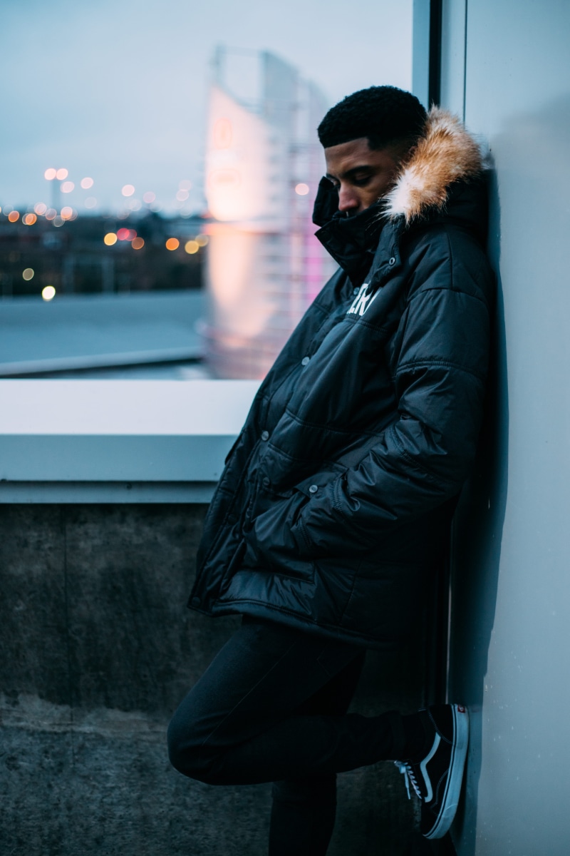 black, leather, side view, clothing, architecture, leisure activity, city, leather jacket, man, near, looking, photography, real people, beautiful woman