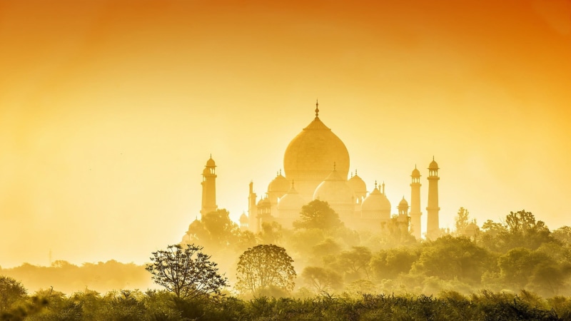 architecture, religion, place of worship, mosque, sun, sky, sunset, spirituality, trees, building exterior, textured effect, sunlight, fog, built structure