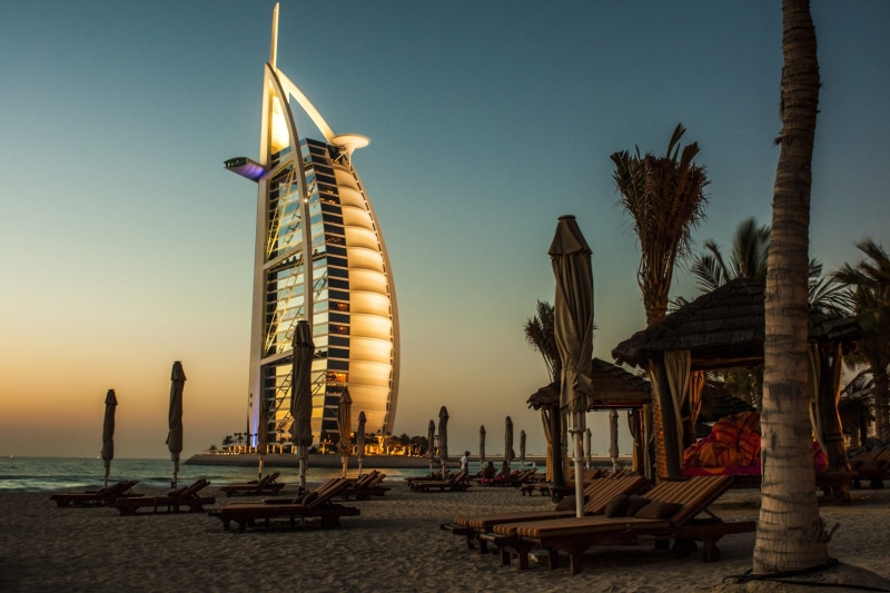 sunset, land, outdoors, tall - high, building exterior, burj al arab, architecture, beach, ocean, clear sky, transportation, tower, 1080P, nautical vessel