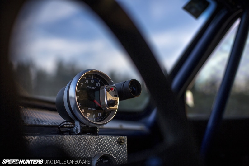 car interior, vehicle interior, cloud - sky, control panel, mode of transportation, outdoors, glass - material, day, car, sky, focus on foreground, Speedhunters