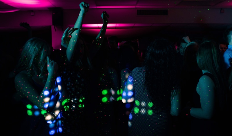 group of people, nightlife, enjoyment, bar, real people, human body part, inside, indoors, 5K, people, large group of people, arms raised, illuminated