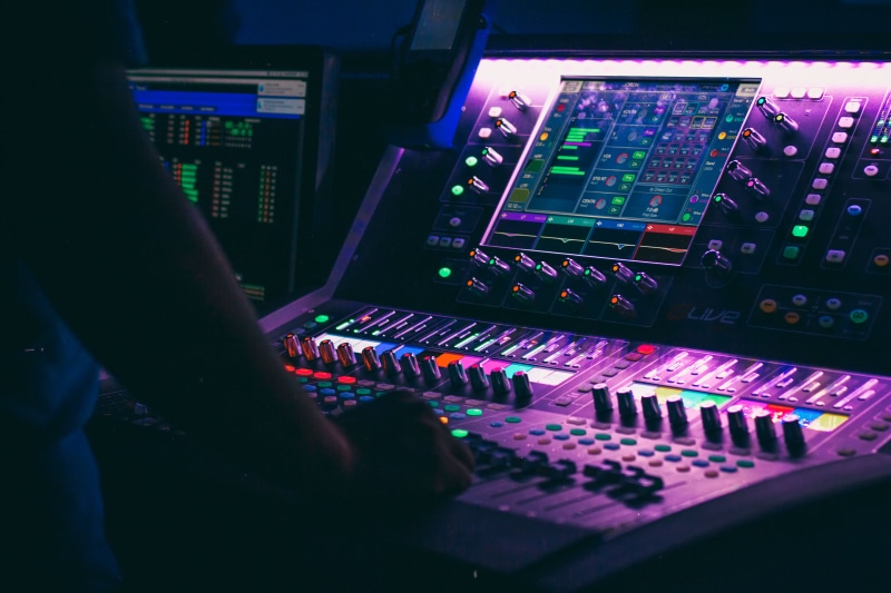 control panel, button, studio, sound, man, hand, church, complexity, computer, control, swutches, board, real people, sound system, controller, sound recording equipment