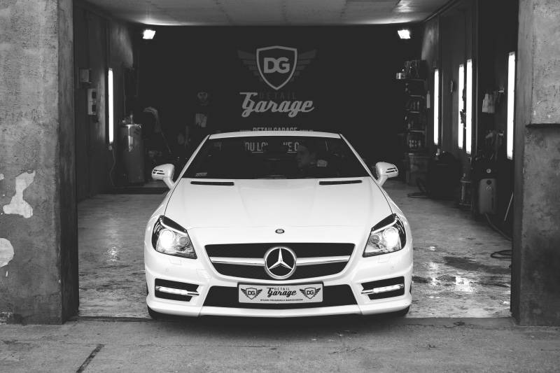 transport, inside, car care, style, outdoors, old-fashioned, garage, sign, parking, technology, western script, day, number, motor, automobile, design