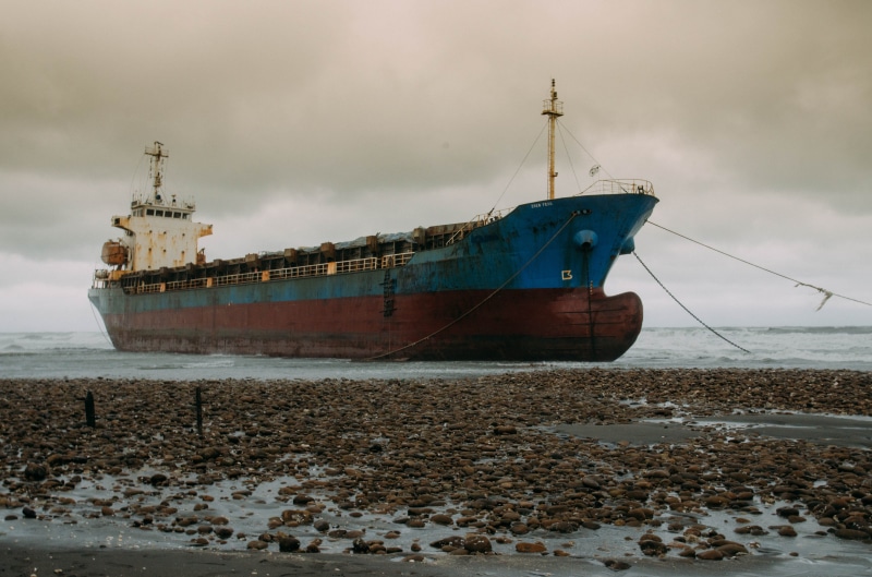 vessel, dock, vehicle, sand, daytime, shore, barge, nautical vessel, watercraft, land, transportation, travel, nature, sailboat, mode of transportation
