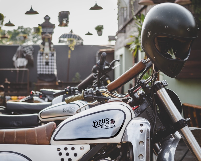 bicycle, city, transportation, built structure, mode of transportation, architecture, day, scooter, motorcycles, motorcycle, street, vintage, stationary